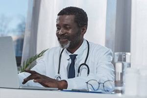 training-partner doctor at a computer